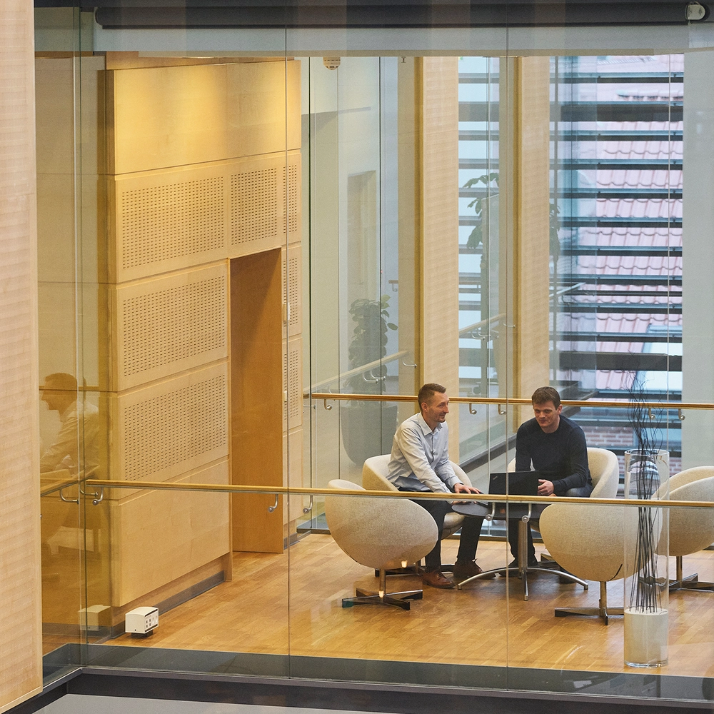 Male employees in a meeting room